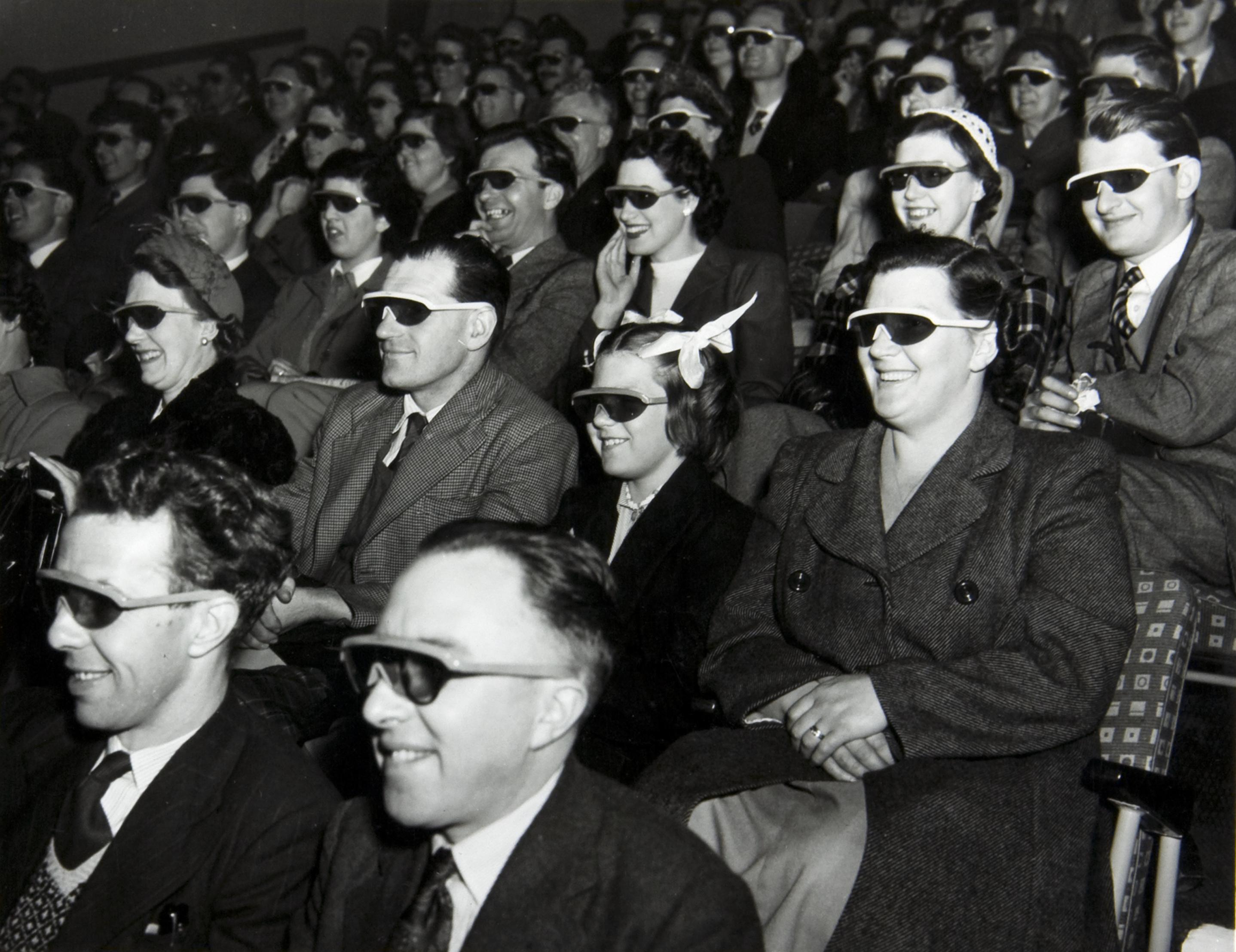 WORK25/208 (3647) Theatre audience wearing 3D glasses