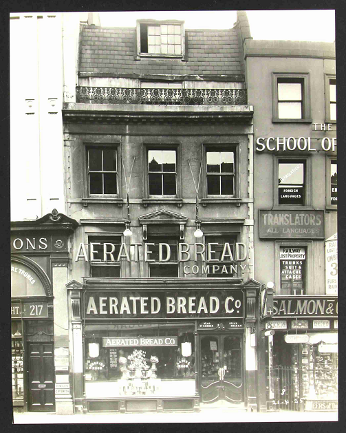 A four-storey, terraced building occupied by the 'Aerated Bread Company' at No. 216 Piccadilly, London, 1925 (catalogue reference CRES 43/151/8).