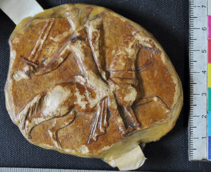 Photograph of the Great seal of Richard I, from 1189, depicting a knight on horseback. The image shows it is 7cm in height. Catalogue reference DL 10/42.