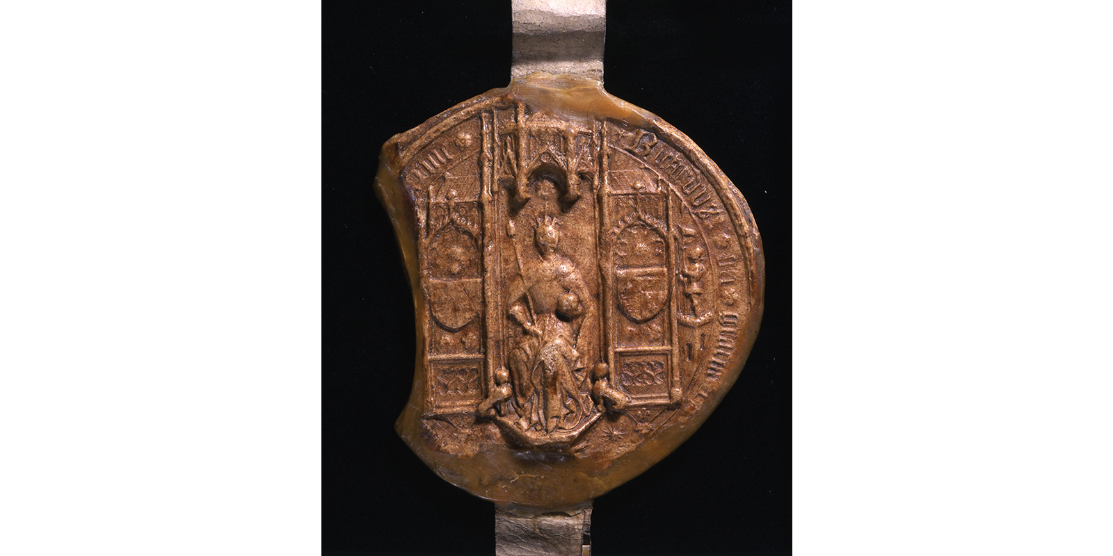 Seal of Richard III, displaying him on his throne, holding a sceptre.
