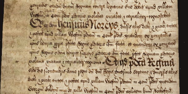 A beige manuscript with 16th century embellished writing - the document is a trial record of Anne Boleyn from 1536 for high treason, adultery and incest