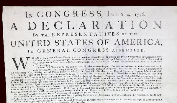 A section of the United States Declaration of Independence, a typed document with large size type at the top reading In Congress, July 4 1776 a Declaration by the Representatives of the United States of America