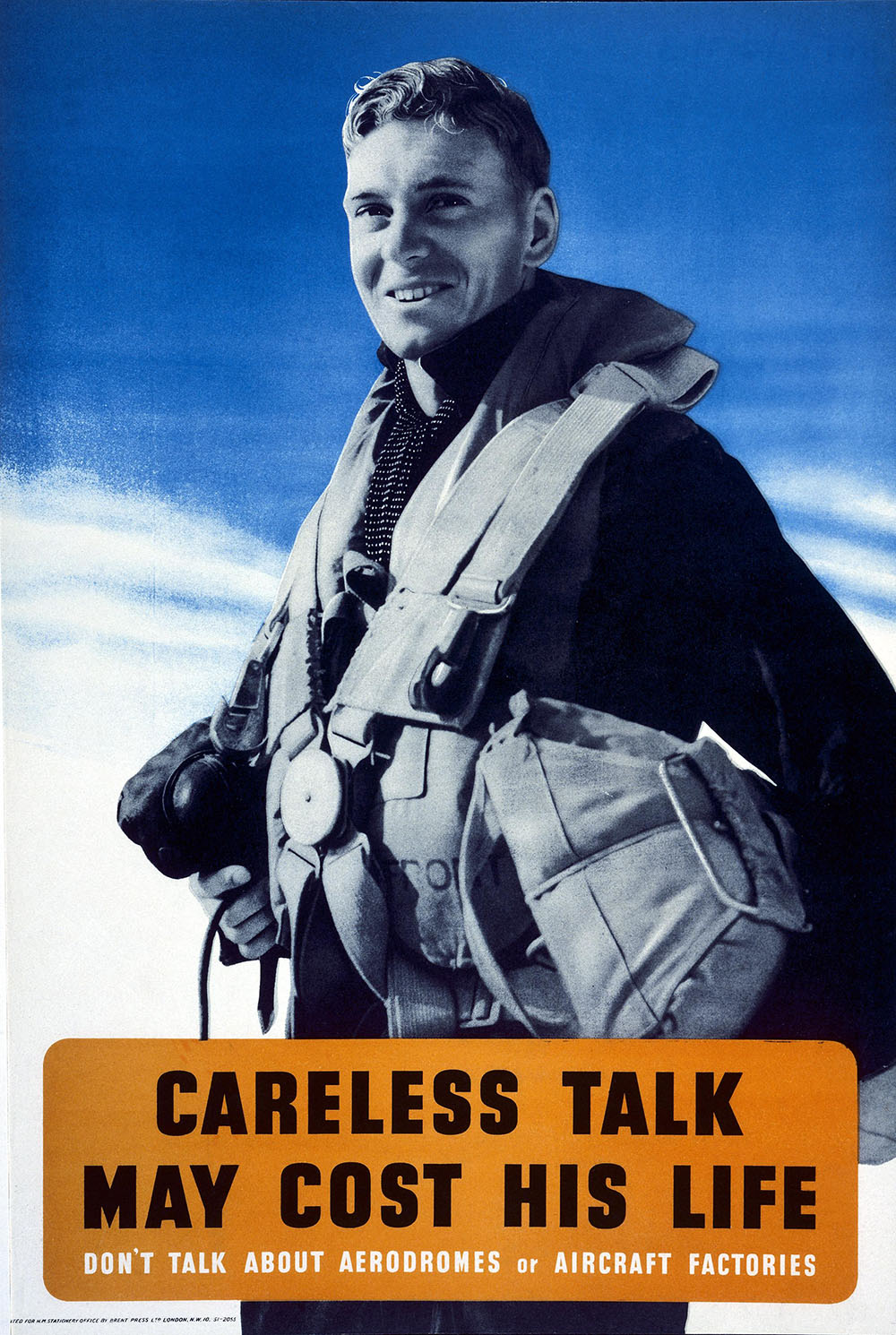 A man in pilot gear smiles at the viewer above the poster slogan.