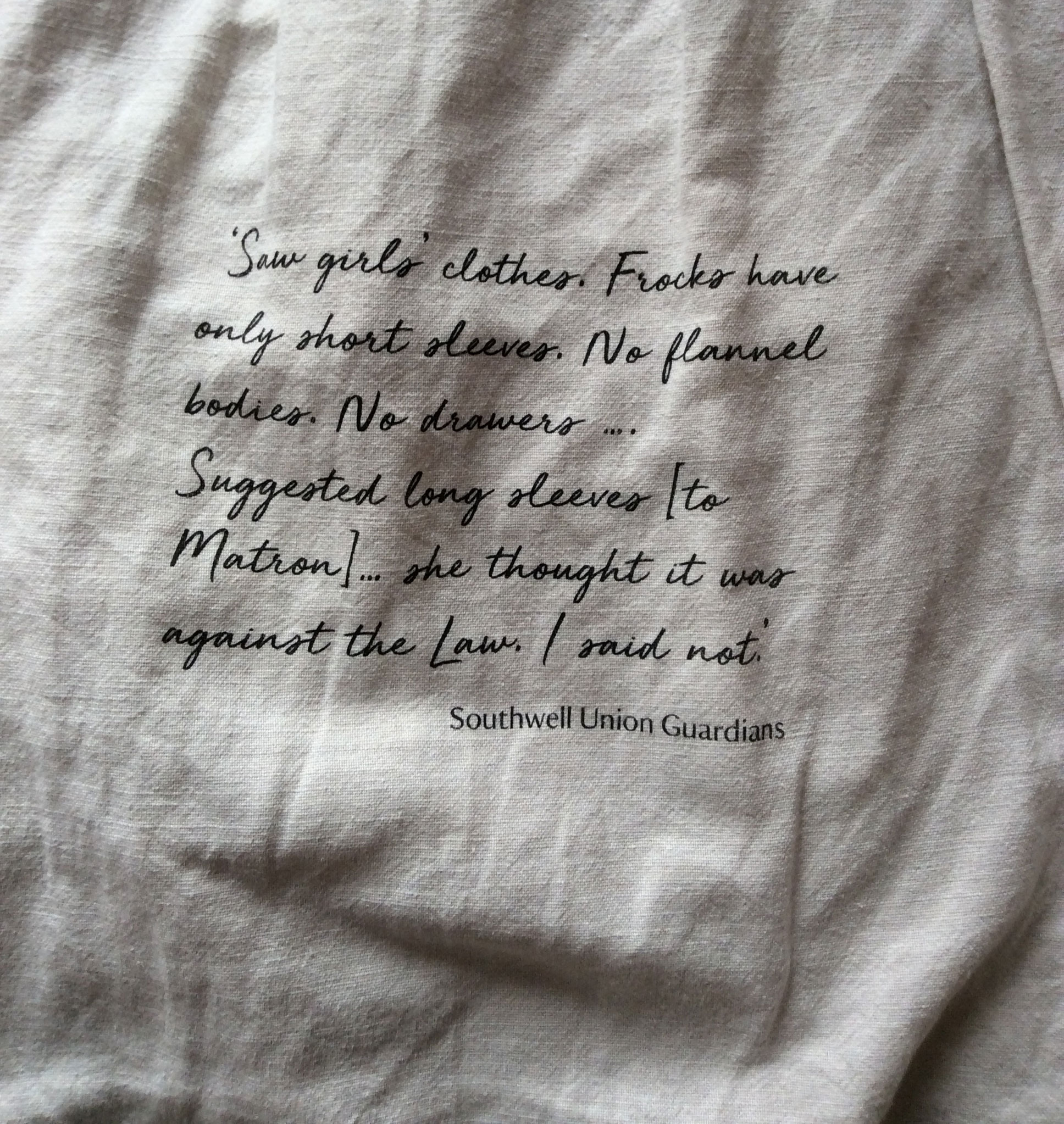 Text written on cloth quoting Southwell Union Guardians