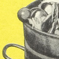 Cropped image. We can see part of a grey object that appears to be a hollow cylinder with grey and white materials inside.
