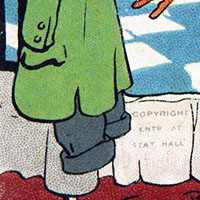 Cropped image. We can see part of a green jacket and some trousers hanging above some white fabric.