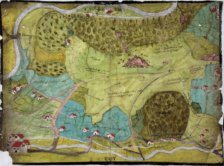 Colourful map without precise detail, features a river and lakes, rocks and woodlands, tracks and white houses with red roofs. Punctuated with old writing, difficult to read.
