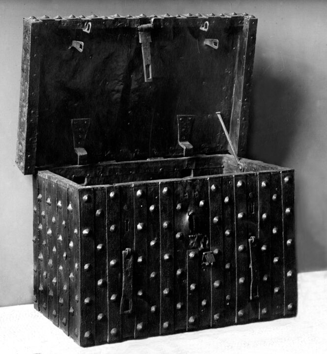 An open chest made out of iron.