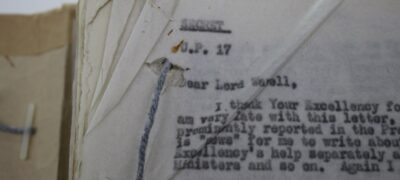 Tears around the tag hole on a page within a tagged file.