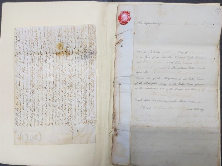Two handwritten documents in an archival folder.