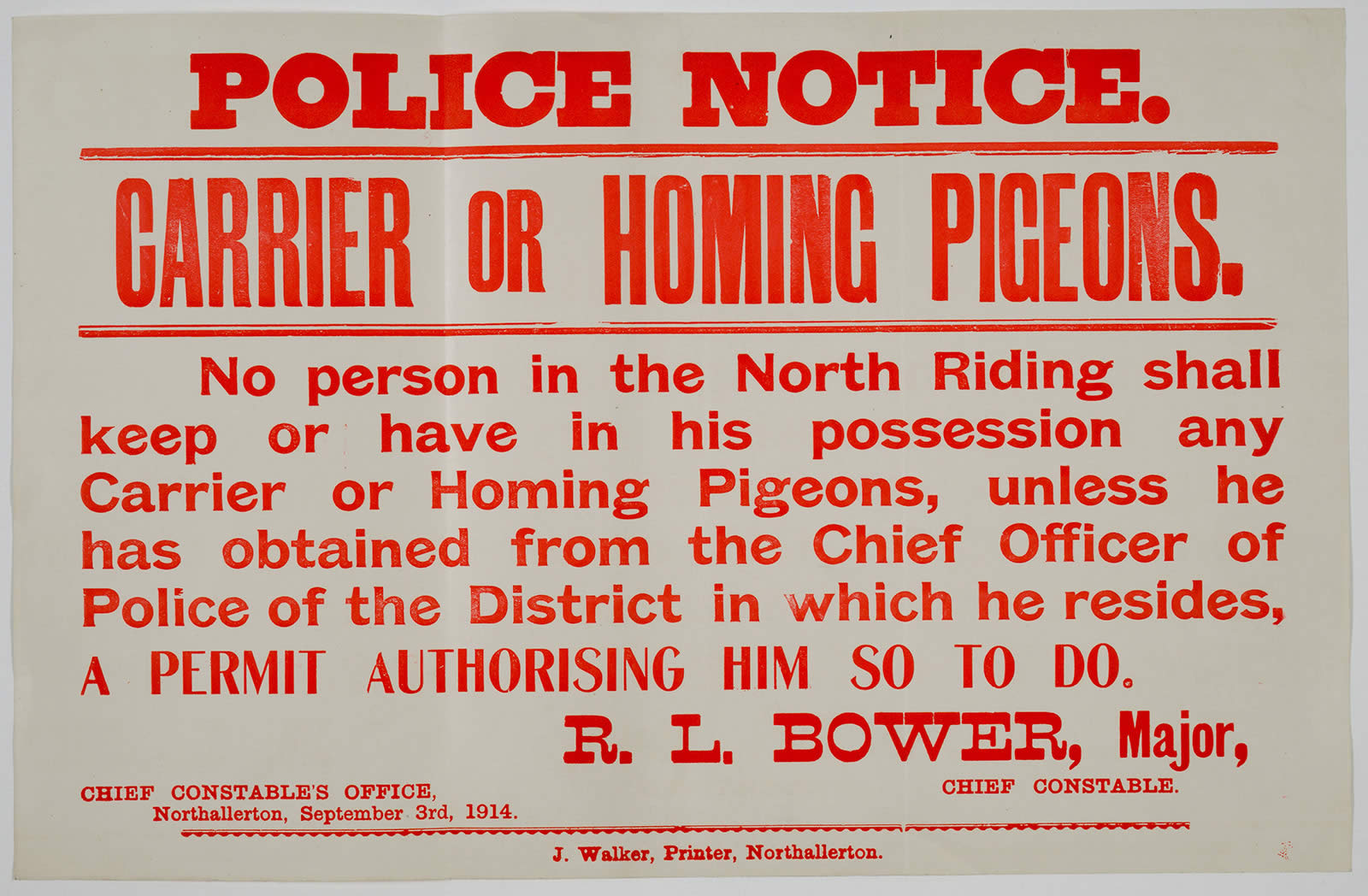 Image of a police notice of 1914 warning owners of homing pigeons that they need a permit 