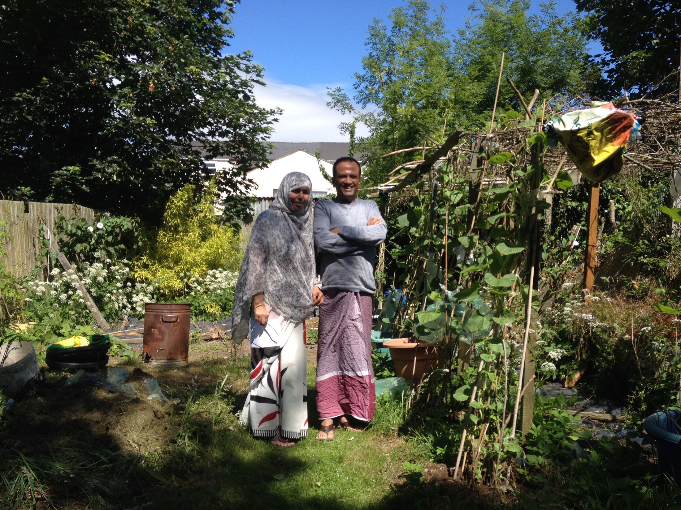 A man and woman in a garden