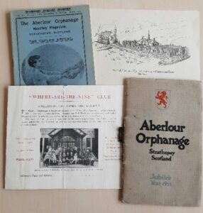 Birds-eye view of a series of documents about Aberlour Orphanage.