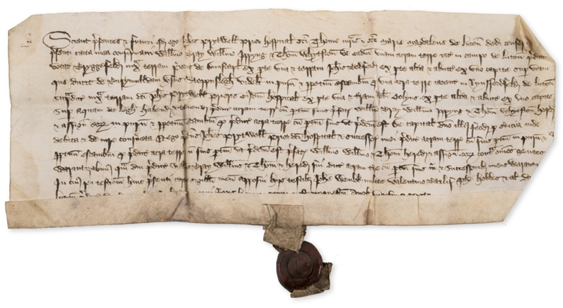 A medieval charter, with wax seal attached
