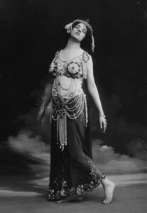 A black and white photo of Maud Allan, posing dressed as Salome. Dated 1910.