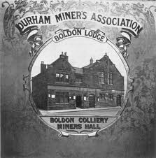 A banner for Boldon Colliery Miners that reads 'Durham Miners Association', Boldon Lodge and has a picture of Boldon Colliery Miners Hall -