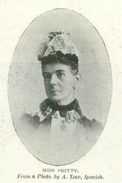 A black and white photograph in an oval shape of a woman dressed in Victorian-era clothes and the caption 'Miss Pritty From a photo by A.Tear Ipswich'