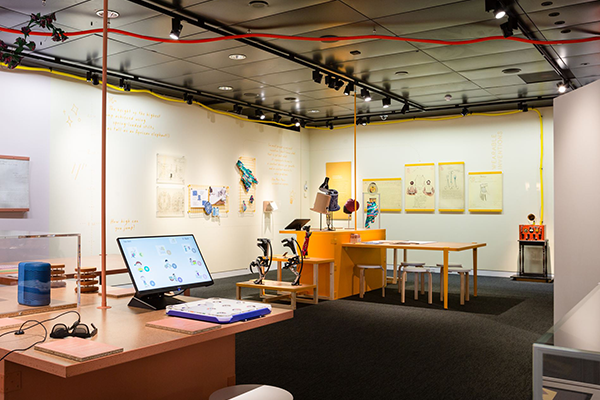 Wide shot of exhibition featuring various inventions. 
